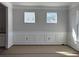 Dining area featuring white chair rail and picture frame molding with two windows allowing natural light at 349 Blue Oak Dr, Moncks Corner, SC 29461