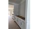 Kitchen area featuring white cabinets, drawers, and stainless steel hardware providing great storage at 349 Blue Oak Dr, Moncks Corner, SC 29461