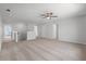 Bright loft area with neutral carpet and multiple access doors to other rooms at 349 Blue Oak Dr, Moncks Corner, SC 29461