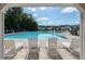 Relaxing view of the community pool with lounge chairs under the shelter at 349 Blue Oak Dr, Moncks Corner, SC 29461