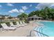 Large community pool and lounge chairs, an ideal setting for leisurely relaxation and neighborhood recreation at 349 Blue Oak Dr, Moncks Corner, SC 29461