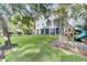 Large backyard with playground and green lawn at 400 Bay Crossing Rd, Mount Pleasant, SC 29464