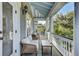 Relaxing balcony with wicker furniture, offering a view of lush greenery at 400 Bay Crossing Rd, Mount Pleasant, SC 29464
