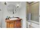 Bathroom with a wooden vanity, a vessel sink, and a shower/tub combo at 400 Bay Crossing Rd, Mount Pleasant, SC 29464