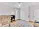 Pastel-pink bedroom with crib, closet, and built-in shelves at 400 Bay Crossing Rd, Mount Pleasant, SC 29464