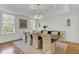Elegant dining room with hardwood floors, chandelier, and large windows at 400 Bay Crossing Rd, Mount Pleasant, SC 29464