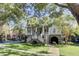 Two-story house with a large front porch and landscaped yard at 400 Bay Crossing Rd, Mount Pleasant, SC 29464