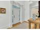 Bright entryway with hardwood floors and a wooden console table at 400 Bay Crossing Rd, Mount Pleasant, SC 29464