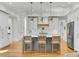Modern kitchen with gray island, white cabinets, and gold accents at 400 Bay Crossing Rd, Mount Pleasant, SC 29464