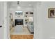 Cozy living room with a fireplace, built-in shelving and light-colored sofa at 400 Bay Crossing Rd, Mount Pleasant, SC 29464