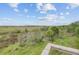 Wooden deck overlooking scenic marshland, showcasing natural beauty with diverse greenery at 400 Bay Crossing Rd, Mount Pleasant, SC 29464