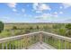 Marsh view from a wooden deck, showcasing the beauty of the coastal landscape at 400 Bay Crossing Rd, Mount Pleasant, SC 29464