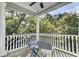 Relaxing porch with white columns and leafy views at 400 Bay Crossing Rd, Mount Pleasant, SC 29464