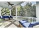 Spacious screened porch with comfortable seating at 400 Bay Crossing Rd, Mount Pleasant, SC 29464