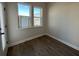 Bedroom with wood flooring and dual windows that flood the room with natural light and offer a view at 5134 Double Eagle, Summerville, SC 29485