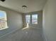 Spacious bedroom with two windows and new flooring at 5134 Double Eagle, Summerville, SC 29485