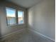 Bright bedroom with two windows and neutral walls at 5134 Double Eagle, Summerville, SC 29485
