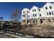 Three-story townhome with white siding and brick accents at 5134 Double Eagle, Summerville, SC 29485