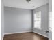 Spacious bedroom with hardwood floors and a large window at 563 Alderly Dr, Moncks Corner, SC 29461