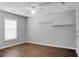 Bedroom with ceiling fan, window blinds, and hardwood floors at 563 Alderly Dr, Moncks Corner, SC 29461