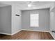 Bright bedroom with ceiling fan, window blinds, and hardwood floors at 563 Alderly Dr, Moncks Corner, SC 29461