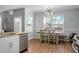 Bright dining area with wood table and chairs at 563 Alderly Dr, Moncks Corner, SC 29461