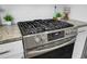 Stainless steel gas range with granite countertop at 563 Alderly Dr, Moncks Corner, SC 29461