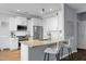 White cabinets, granite counters, and stainless steel appliances in this kitchen at 563 Alderly Dr, Moncks Corner, SC 29461