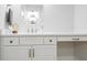 Modern bathroom with white vanity, quartz countertop, and octagon mirror at 748 Maynard Ln, Summerville, SC 29486