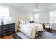 Bright bedroom with hardwood floors, a queen bed, and ample natural light at 748 Maynard Ln, Summerville, SC 29486