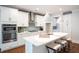 Open concept kitchen boasting white cabinetry, a large island, and stainless steel appliances at 748 Maynard Ln, Summerville, SC 29486