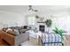 Comfortable living room with hardwood floors, a fireplace, and access to outdoor space at 748 Maynard Ln, Summerville, SC 29486