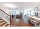 Open floor plan with hardwood floors, a living room, and kitchen at 748 Maynard Ln, Summerville, SC 29486