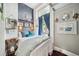 Cozy bedroom with a queen-size bed and unique decor at 12 Bee Street St # A, Charleston, SC 29403