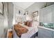 Well-lit bedroom with built-in storage and hardwood floors at 12 Bee Street St # A, Charleston, SC 29403