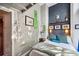 Bright bedroom with a comfortable bed and eclectic wall art at 12 Bee Street St # A, Charleston, SC 29403