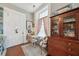 Cozy breakfast nook with antique furniture and a window seat at 12 Bee Street St # A, Charleston, SC 29403