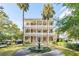 Grand two-story home with a fountain and lush landscaping at 12 Bee Street St # A, Charleston, SC 29403