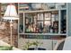 Built-in home bar with ample storage for liquor and glassware at 12 Bee Street St # A, Charleston, SC 29403