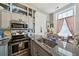 Modern kitchen with stainless steel sink and appliances at 12 Bee Street St # A, Charleston, SC 29403