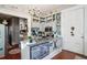 Charming kitchen features granite countertops, stainless steel appliances, and ample cabinetry at 12 Bee Street St # A, Charleston, SC 29403