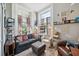 Cozy living room featuring a comfortable sofa and ample natural light at 12 Bee Street St # A, Charleston, SC 29403