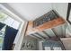 Unique loft area with wooden accents and decorative railing at 12 Bee Street St # A, Charleston, SC 29403