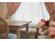 Rustic window seat with colorful pillows offers a cozy reading spot at 12 Bee Street St # A, Charleston, SC 29403