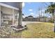 Landscaped backyard with rock border and pool view at 1201 Roma Rd, Hanahan, SC 29410