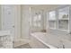Bathroom with soaking tub and walk-in shower at 1201 Roma Rd, Hanahan, SC 29410