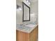 Bathroom vanity with granite countertop, mirror, and light fixtures at 1201 Roma Rd, Hanahan, SC 29410