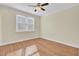 Bright bedroom with hardwood floors and window at 1201 Roma Rd, Hanahan, SC 29410