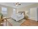 Main bedroom with hardwood floors and en-suite bathroom at 1201 Roma Rd, Hanahan, SC 29410