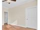 Bedroom with hardwood floors and door to hallway at 1201 Roma Rd, Hanahan, SC 29410